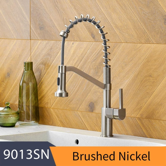 WANFAN brushed brass kitchen faucet with single lever and pull-down spray head, showcasing a contemporary design for modern kitchens.