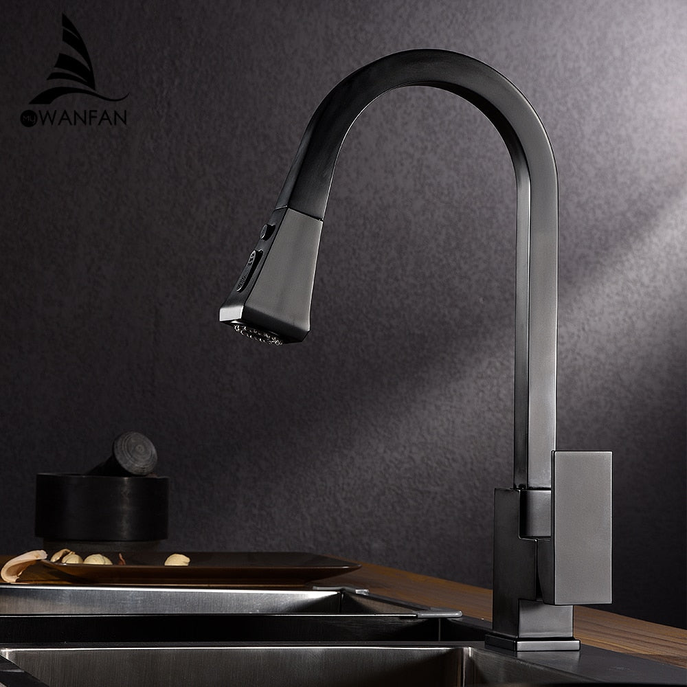 A sleek silver kitchen faucet with a pull-out tap and single hole handle, made of solid brass, featuring a 360-degree swivel design.