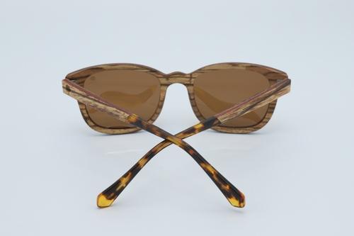 Lady Elliot Sunglasses made from zebra skateboard material with brown polarized lenses, elegantly designed for style and UV protection.