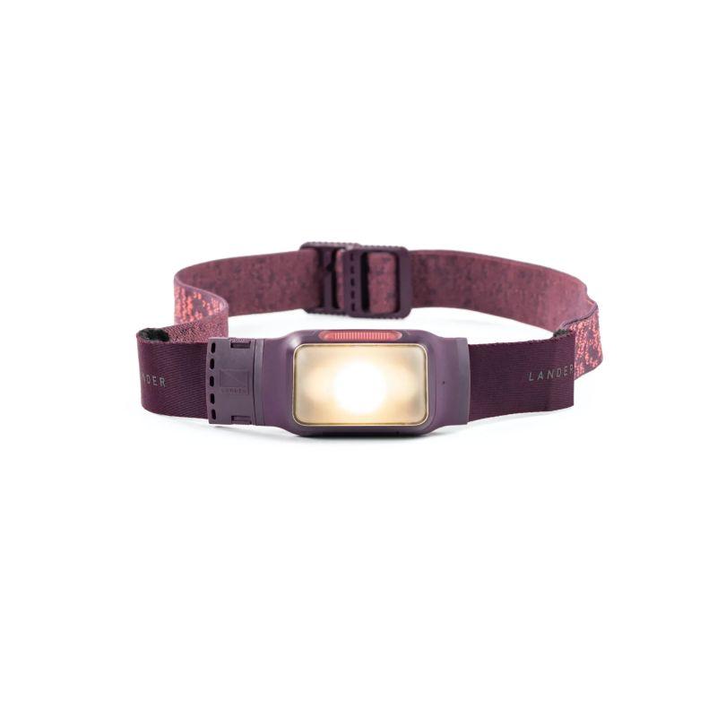 LANDER Kiva Headlamp in vibrant purple color, featuring an adjustable headband and bright LED light for outdoor activities.