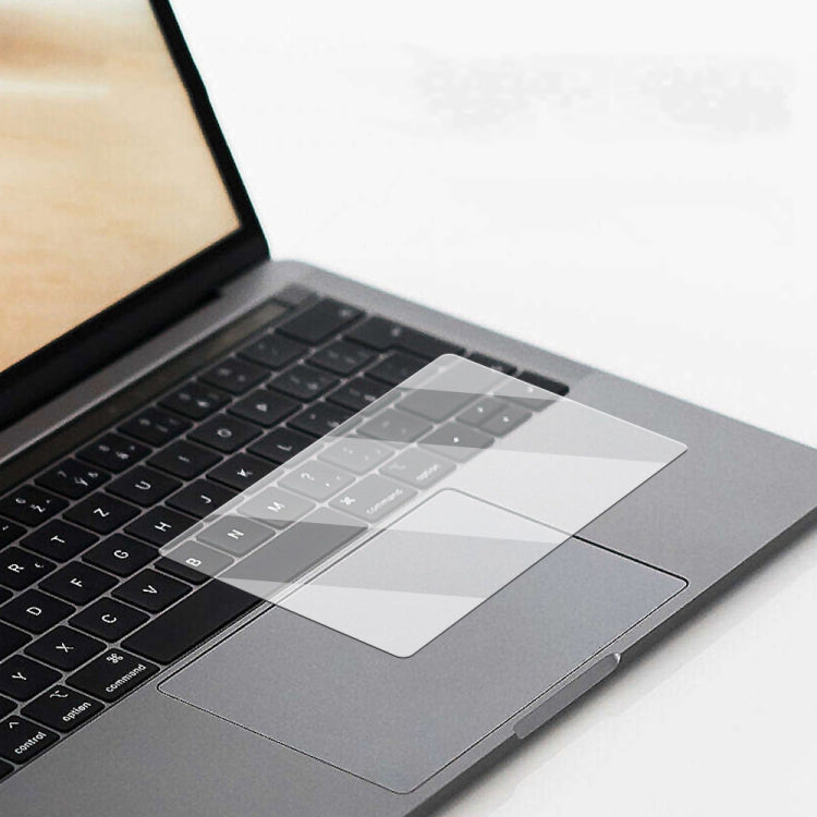 Transparent frosted touchpad film for MacBook Pro 16 inch, showcasing its dust-proof and scratch-resistant features.