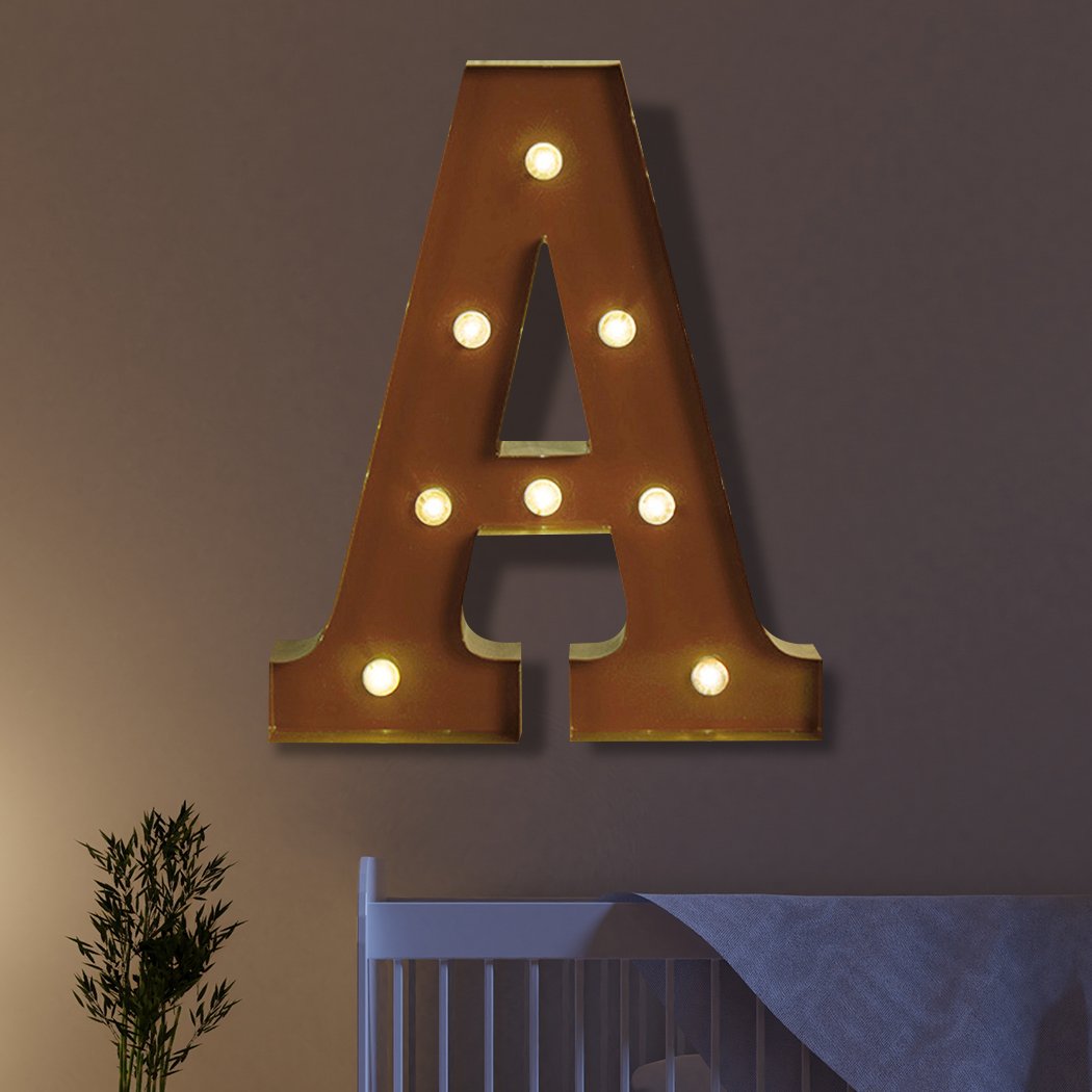 LED Metal Letter Lights in a stylish arrangement, perfect for events and parties, showcasing a warm glow and personalized messages.