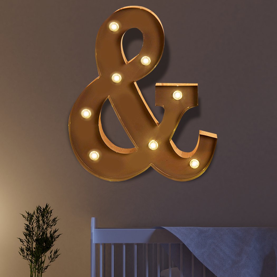 LED Metal Letter Lights in a stylish setting, showcasing their warm glow and personalized design for events.