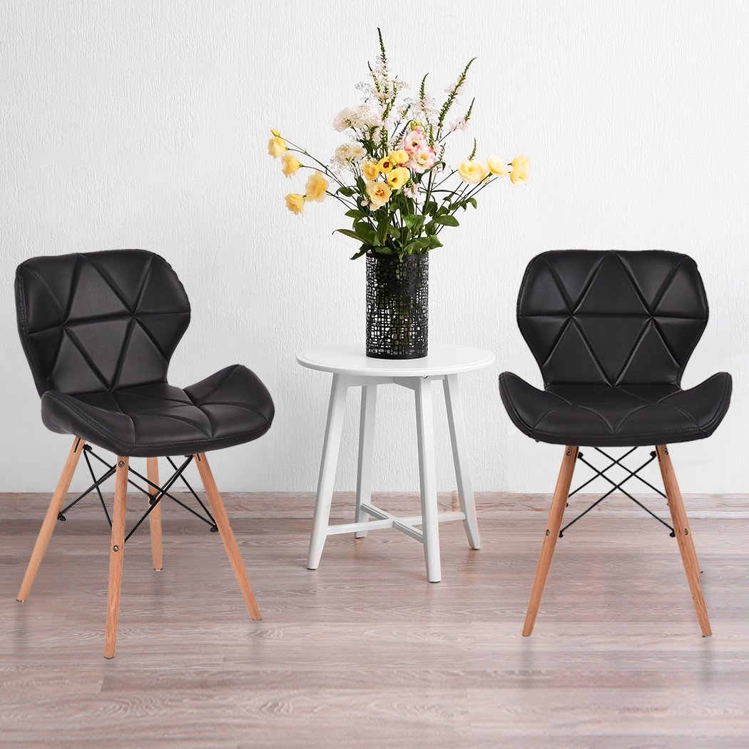 Levede 4x Retro Replica PU Leather Dining Chair set featuring black PU leather seats and beech wooden legs, ideal for dining and cafe settings.