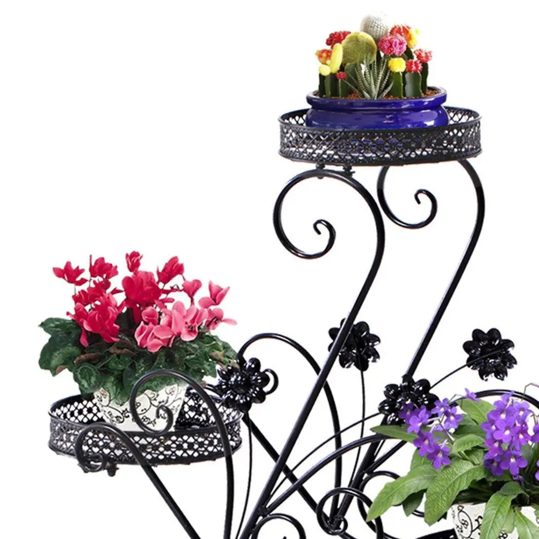 Levede Plant Stand featuring a durable steel frame with an elegant imitation rattan design, perfect for indoor and outdoor plant display.