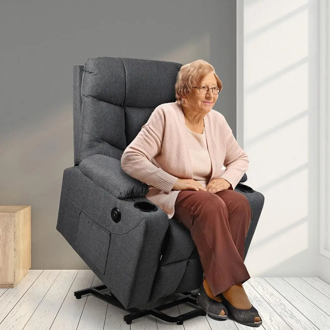 Levede Recliner Chair in grey fabric with electric lift mechanism, plush padding, and cup holders, designed for comfort and ease of use.