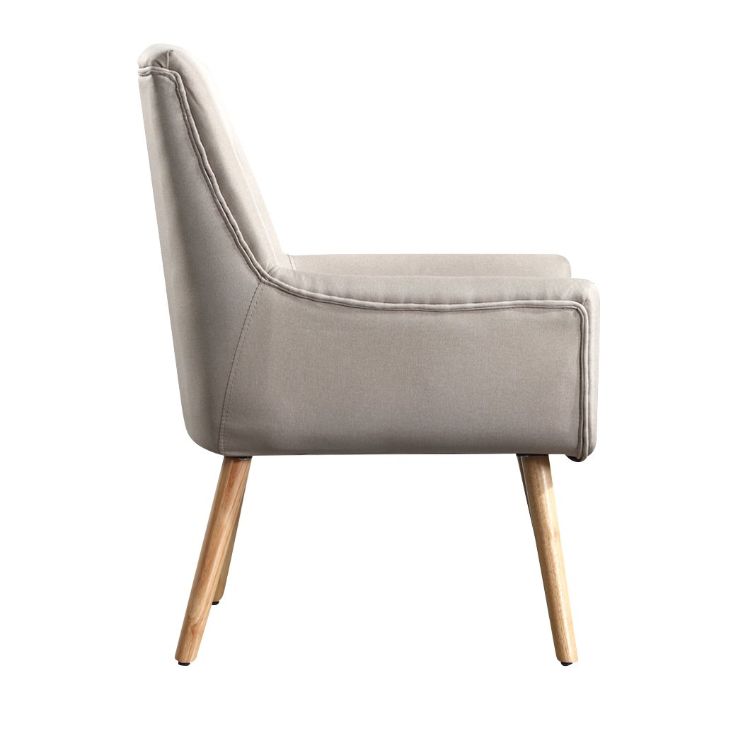 Levede Upholstered Fabric Dining Chair in beige with tufted backrest and wooden legs, showcasing modern and retro design.