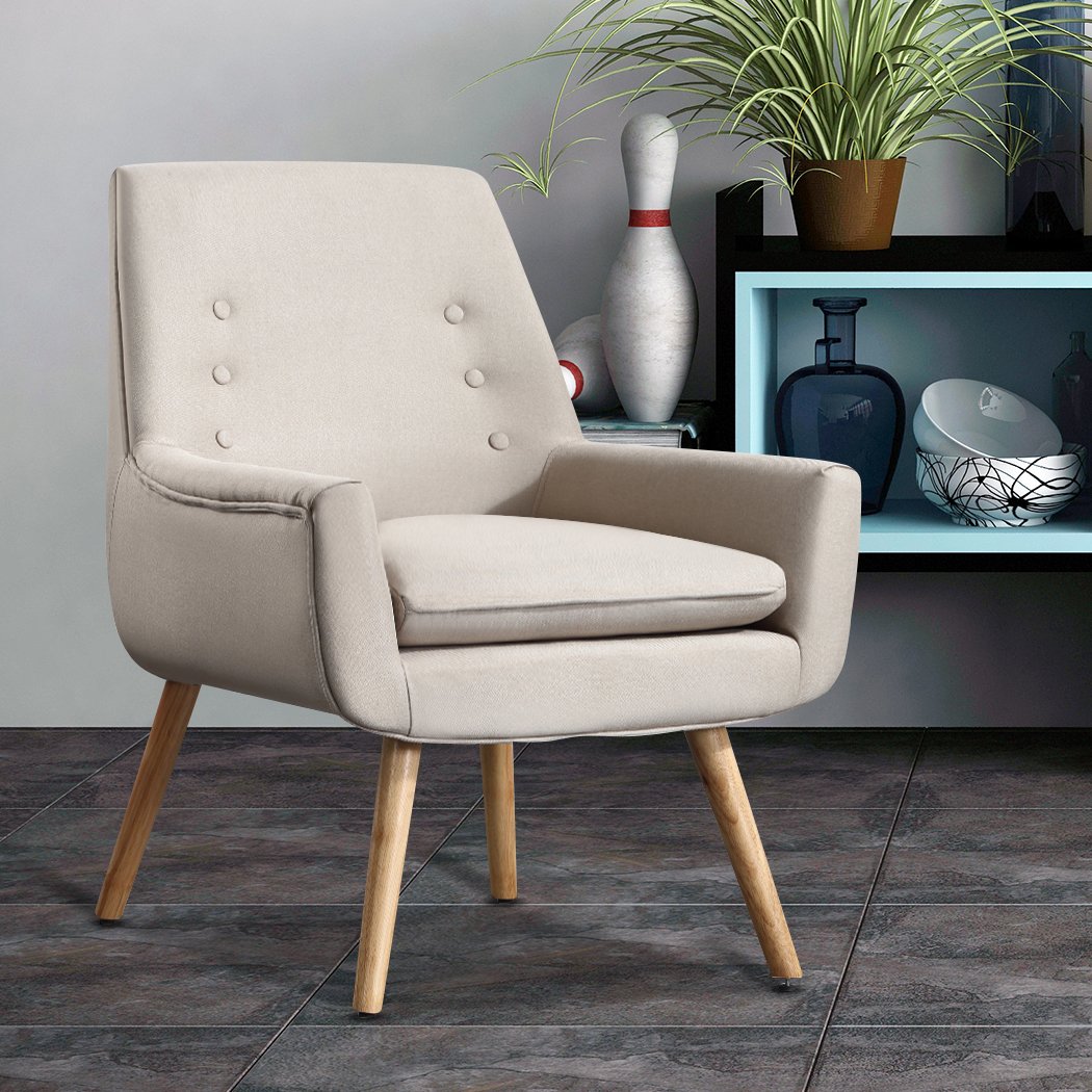 Levede Upholstered Fabric Dining Chair in beige with tufted backrest and wooden legs, showcasing modern and retro design.