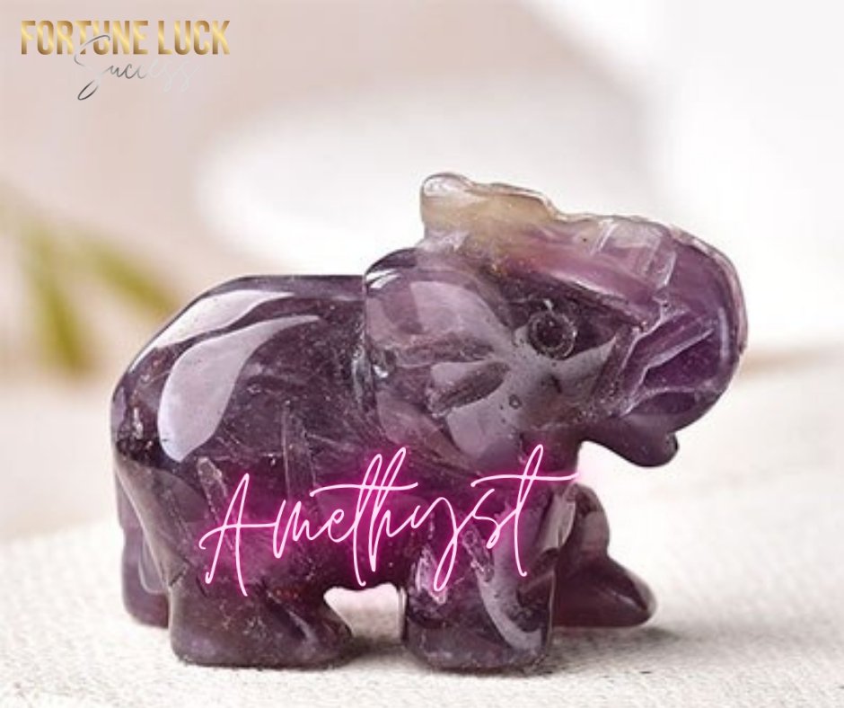 A limited edition set of four crystal elephants, each handcrafted from unique crystals including amethyst, green aventurine, tiger's eye, and turquoise, symbolizing good fortune.