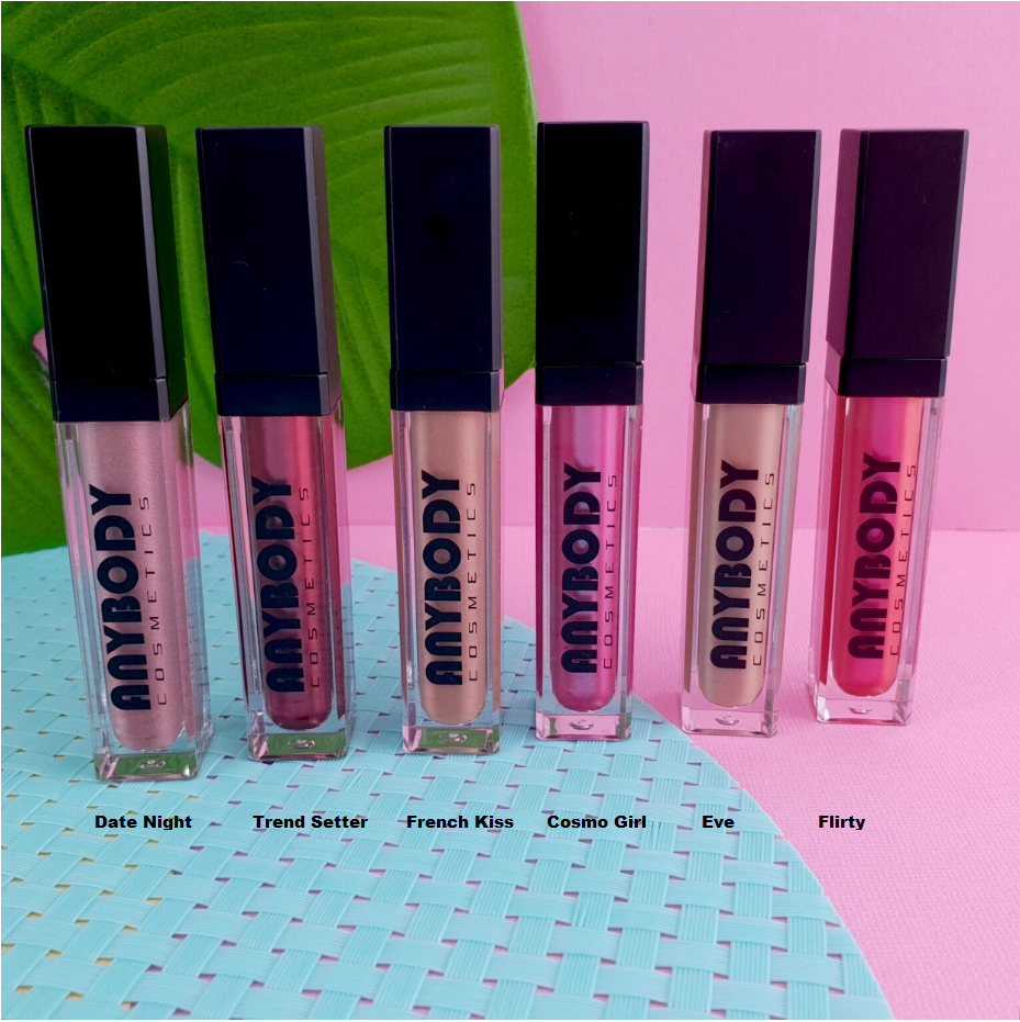 Lipgloss Cosmo Girl in a vibrant tube showcasing its glossy finish and applicator.