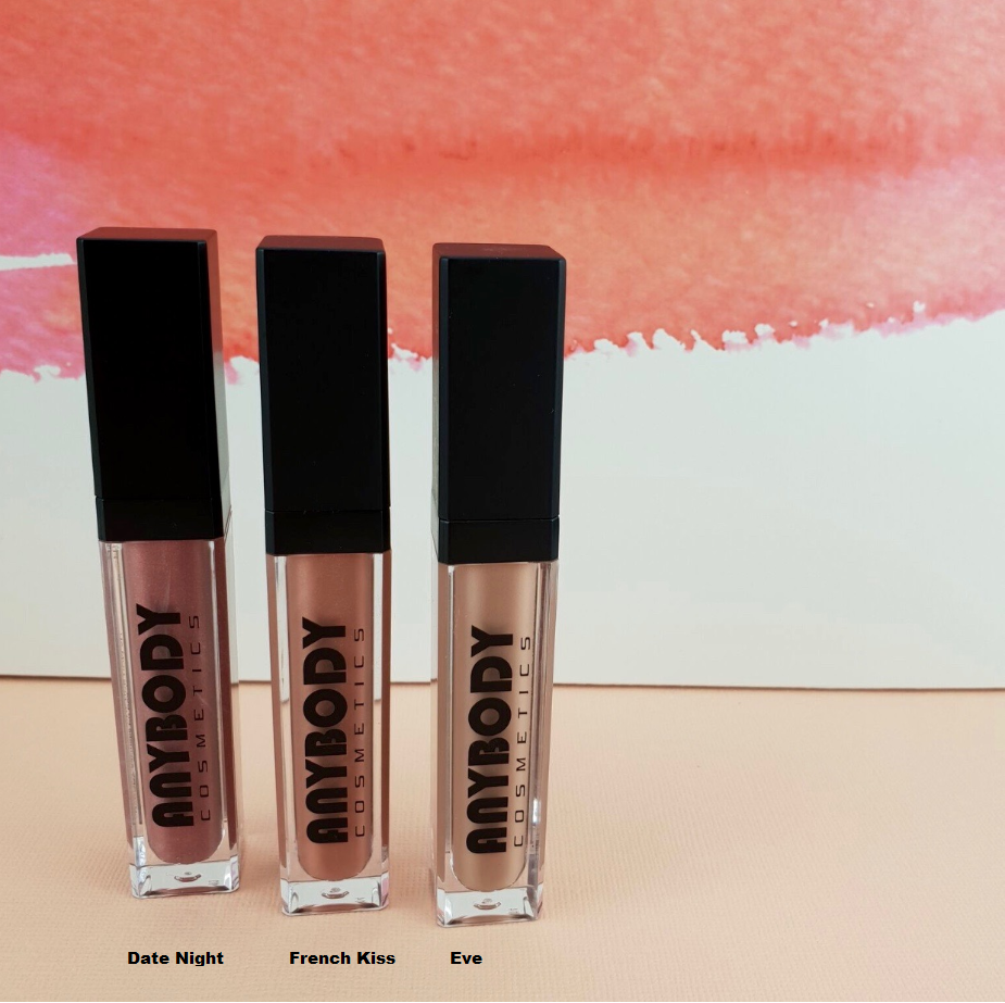 Lipgloss Cosmo Girl in a vibrant tube showcasing its glossy finish and applicator.