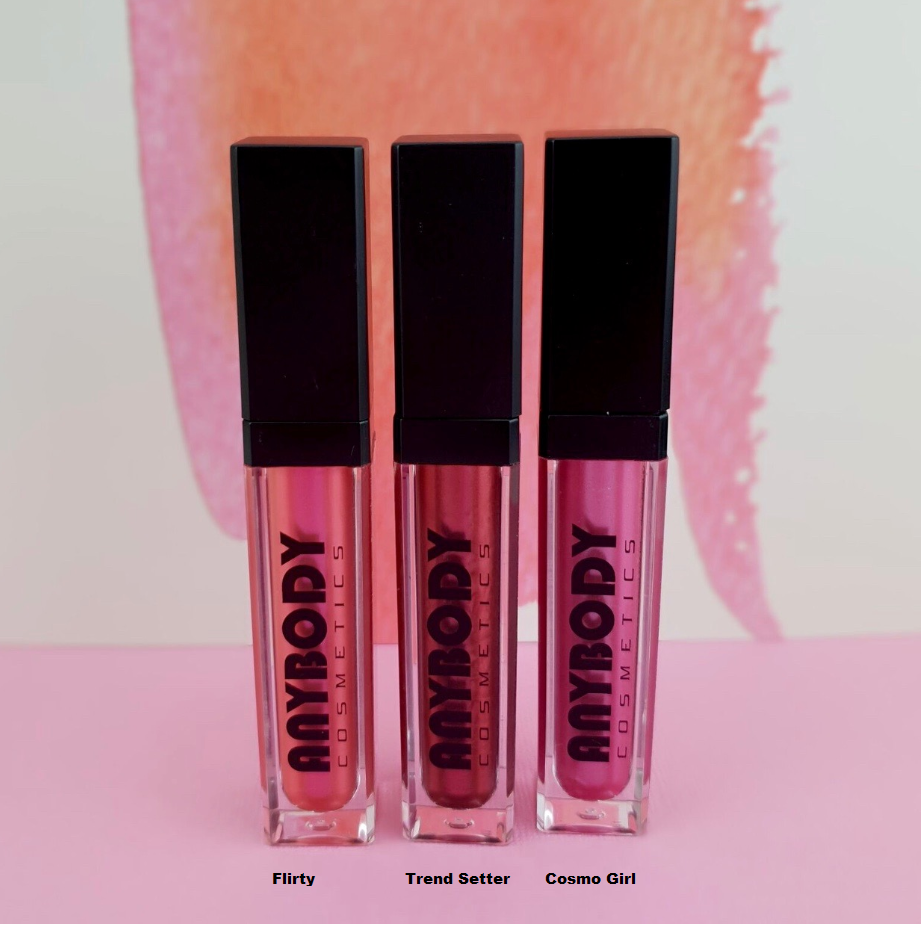 Lipgloss Cosmo Girl in a vibrant tube showcasing its glossy finish and applicator.