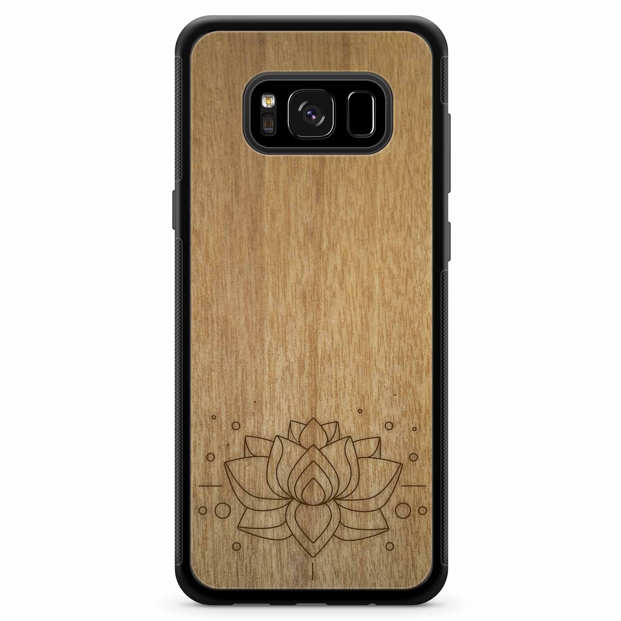 Engraved Lotus Flower wooden phone case showcasing intricate floral design and natural wood grain.