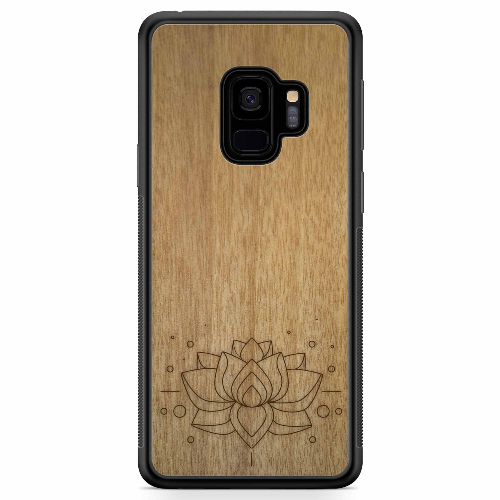 Engraved Lotus Flower wooden phone case showcasing intricate floral design and natural wood grain.