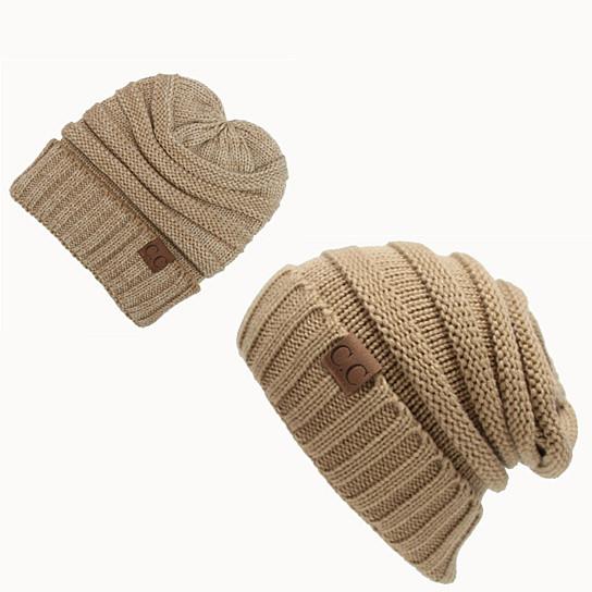 A cozy Loungy And Slouchy Beanie Hat made of cable knit, showcasing its soft texture and slouchy style, perfect for winter lounging.