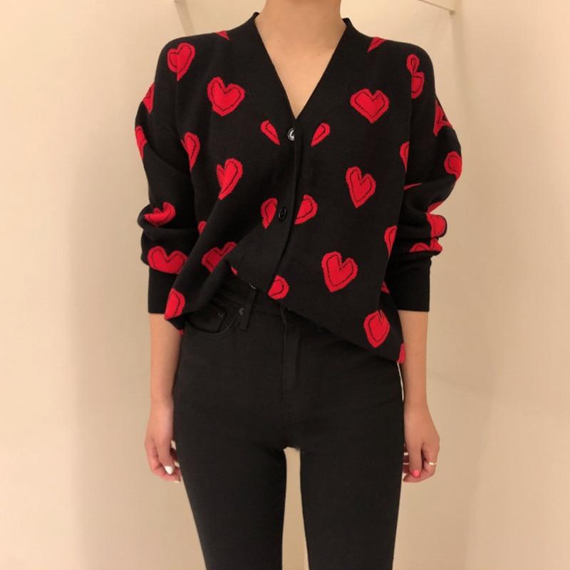 A stylish Love Heart Pattern Warm Sweater Jacket featuring a vintage V-neck design, perfect for women in spring and autumn.