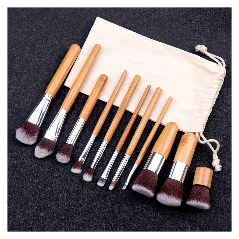 Lucky Beauty Bamboo Brush Set of 11 pcs with soft bristles and sustainable bamboo handles, displayed in a stylish linen cotton bag.