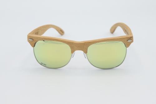 Lumiere Sunglasses featuring a natural Beech wood frame and yellow tinted UV400 polarized lenses, elegantly displayed in a wooden box.