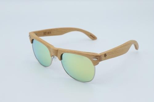 Lumiere Sunglasses featuring a natural Beech wood frame and yellow tinted UV400 polarized lenses, elegantly displayed in a wooden box.