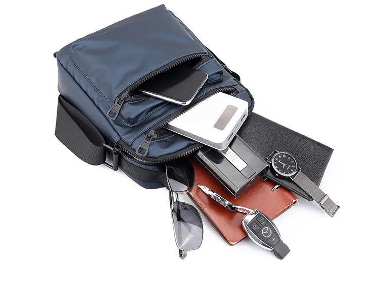 Man Classic Messenger Bag in high-quality nylon, showcasing its multifunctional design and compact size.