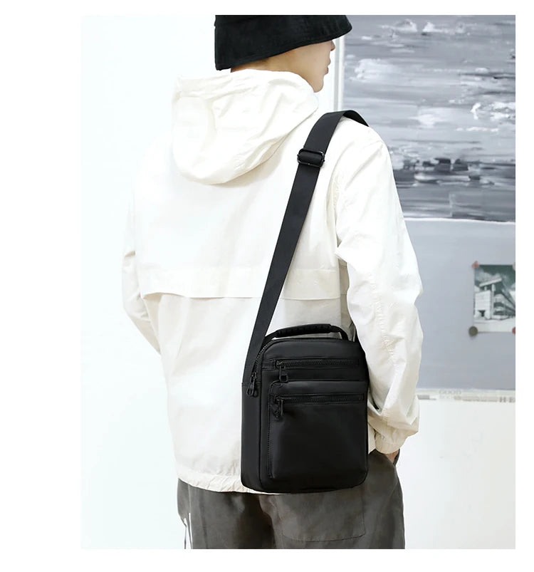 Man Classic Messenger Bag in high-quality nylon, showcasing its multifunctional design and compact size.