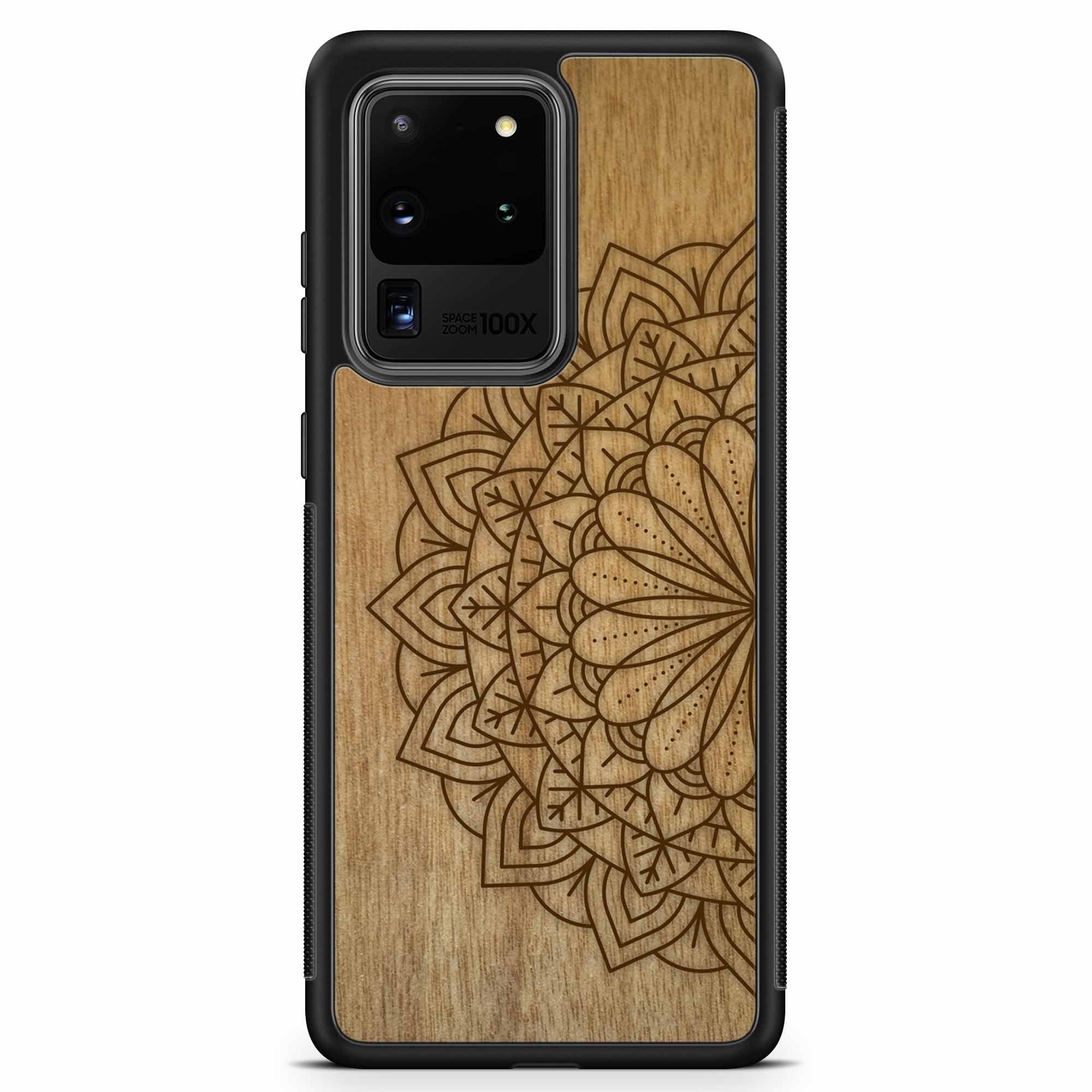 Engraved Mandala wooden phone case on Tanganika wood, showcasing intricate design and natural wood grain.