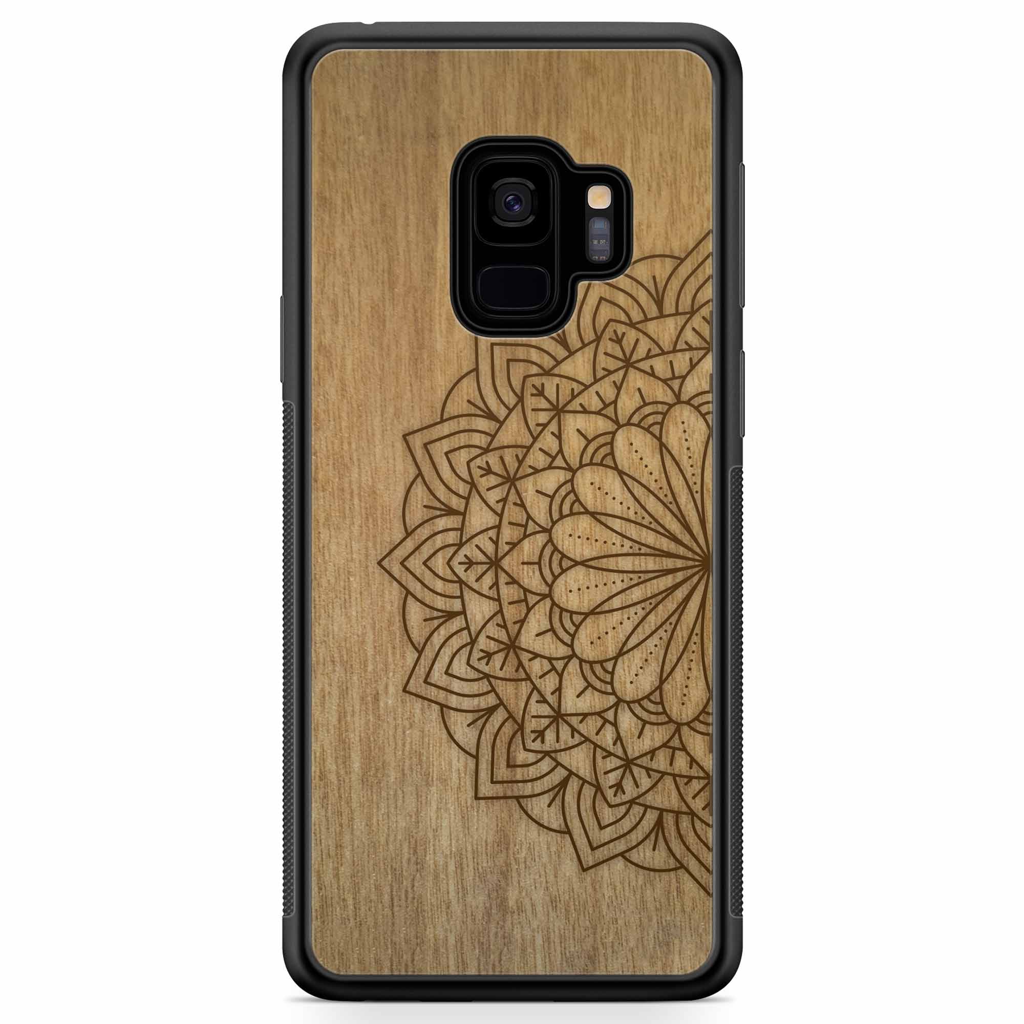 Engraved Mandala wooden phone case on Tanganika wood, showcasing intricate design and natural wood grain.