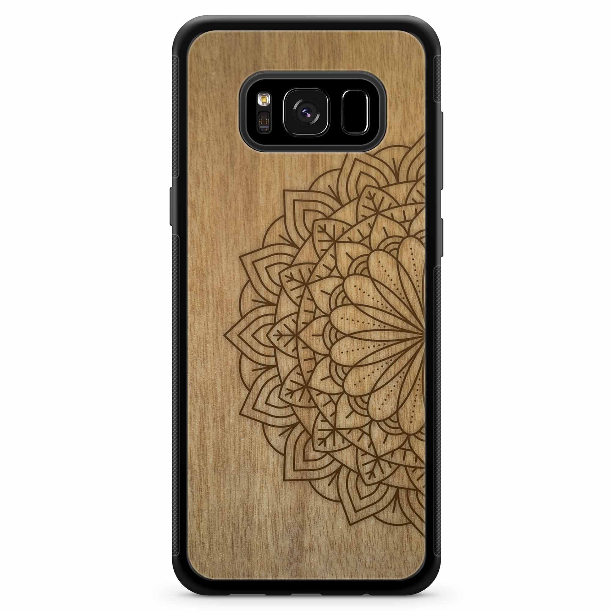 Engraved Mandala wooden phone case on Tanganika wood, showcasing intricate design and natural wood grain.