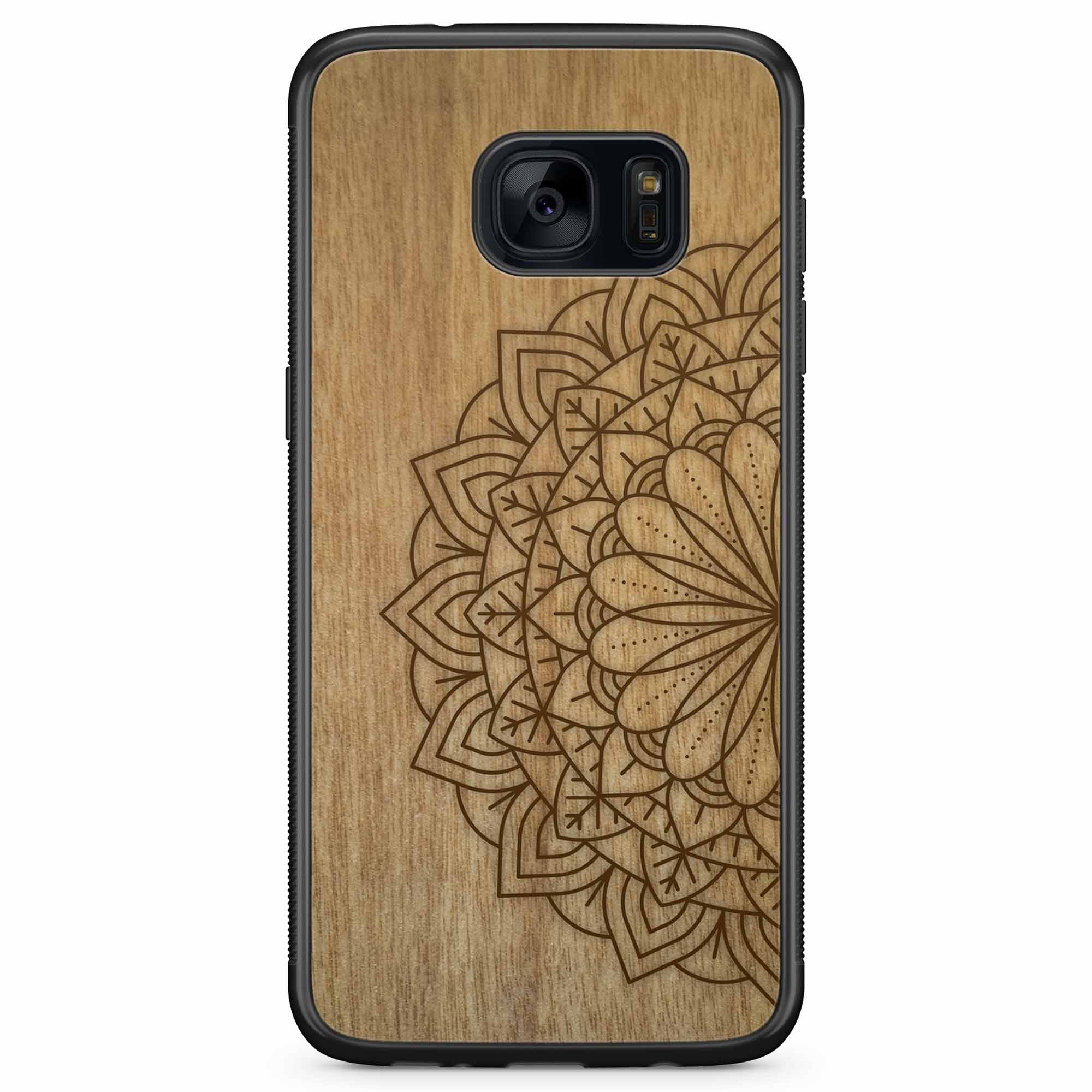 Engraved Mandala wooden phone case on Tanganika wood, showcasing intricate design and natural wood grain.