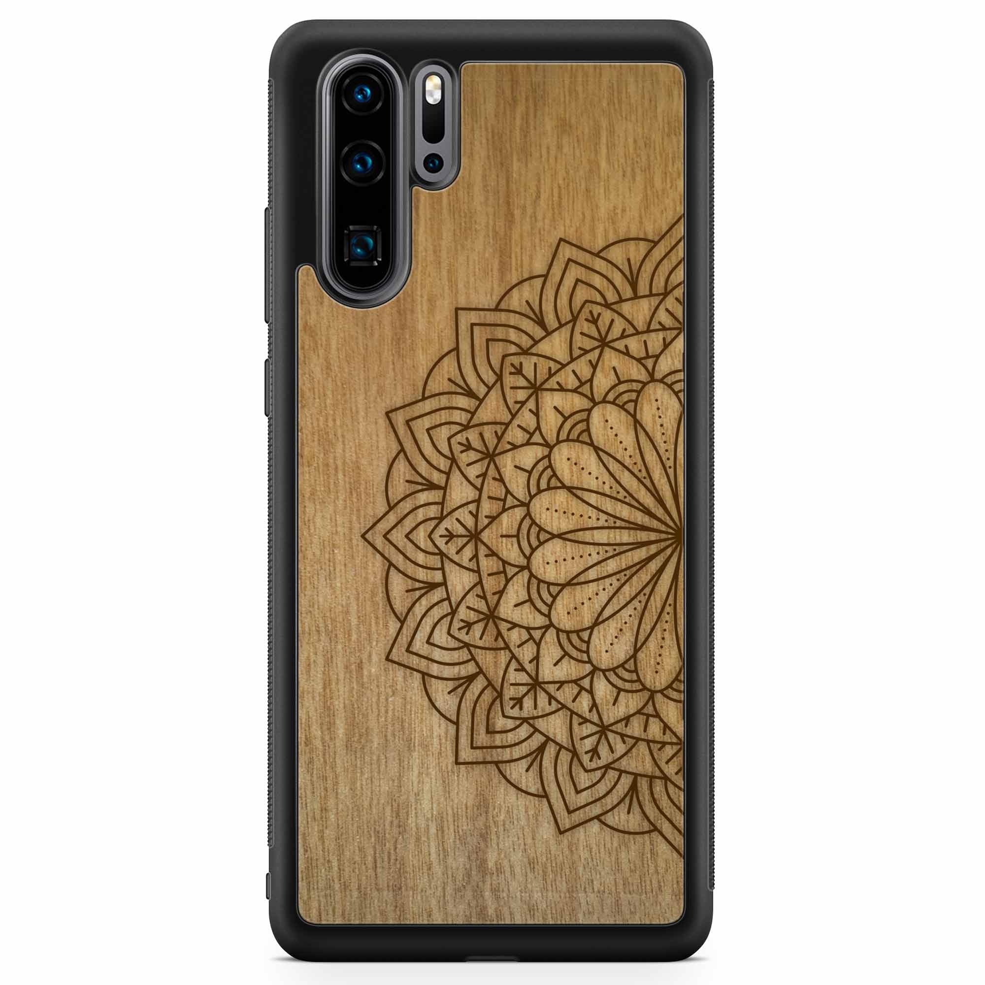 Engraved Mandala wooden phone case on Tanganika wood, showcasing intricate design and natural wood grain.