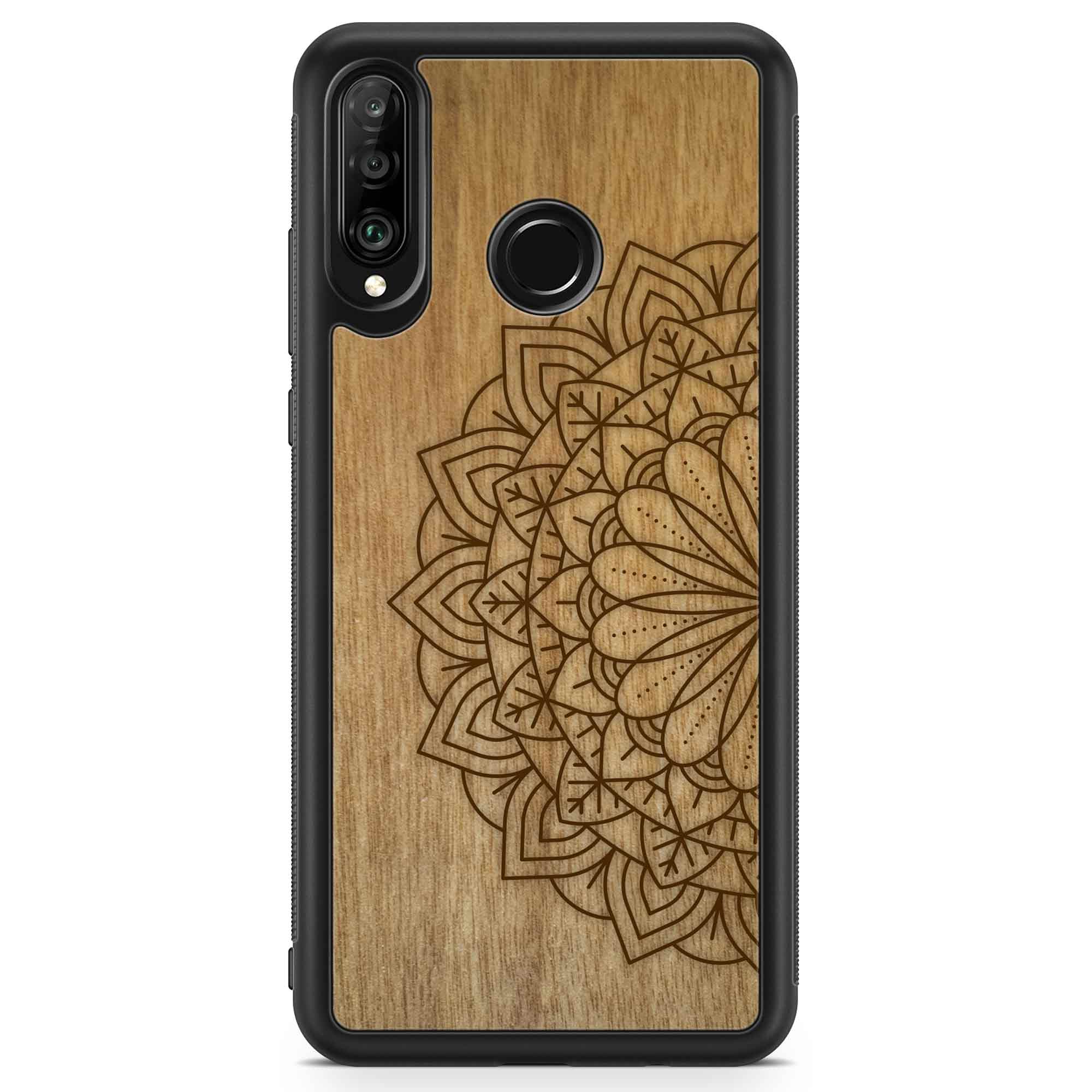 Engraved Mandala wooden phone case on Tanganika wood, showcasing intricate design and natural wood grain.