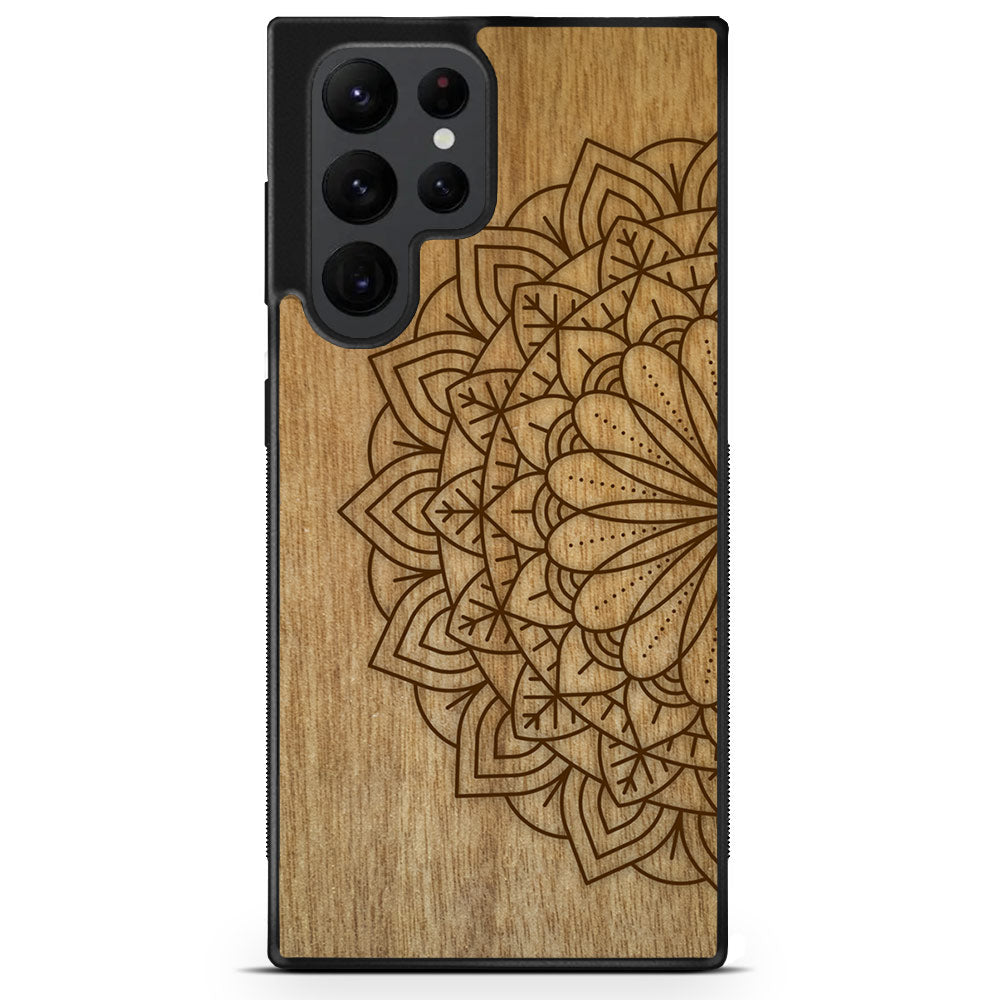 Engraved Mandala wooden phone case on Tanganika wood, showcasing intricate design and natural wood grain.