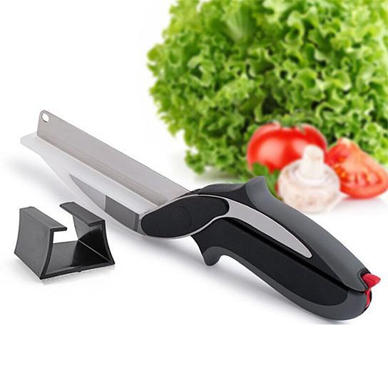 Master Chop handheld food prep dicer and chopper with stainless steel blades and built-in cutting board, ideal for quick meal preparation.