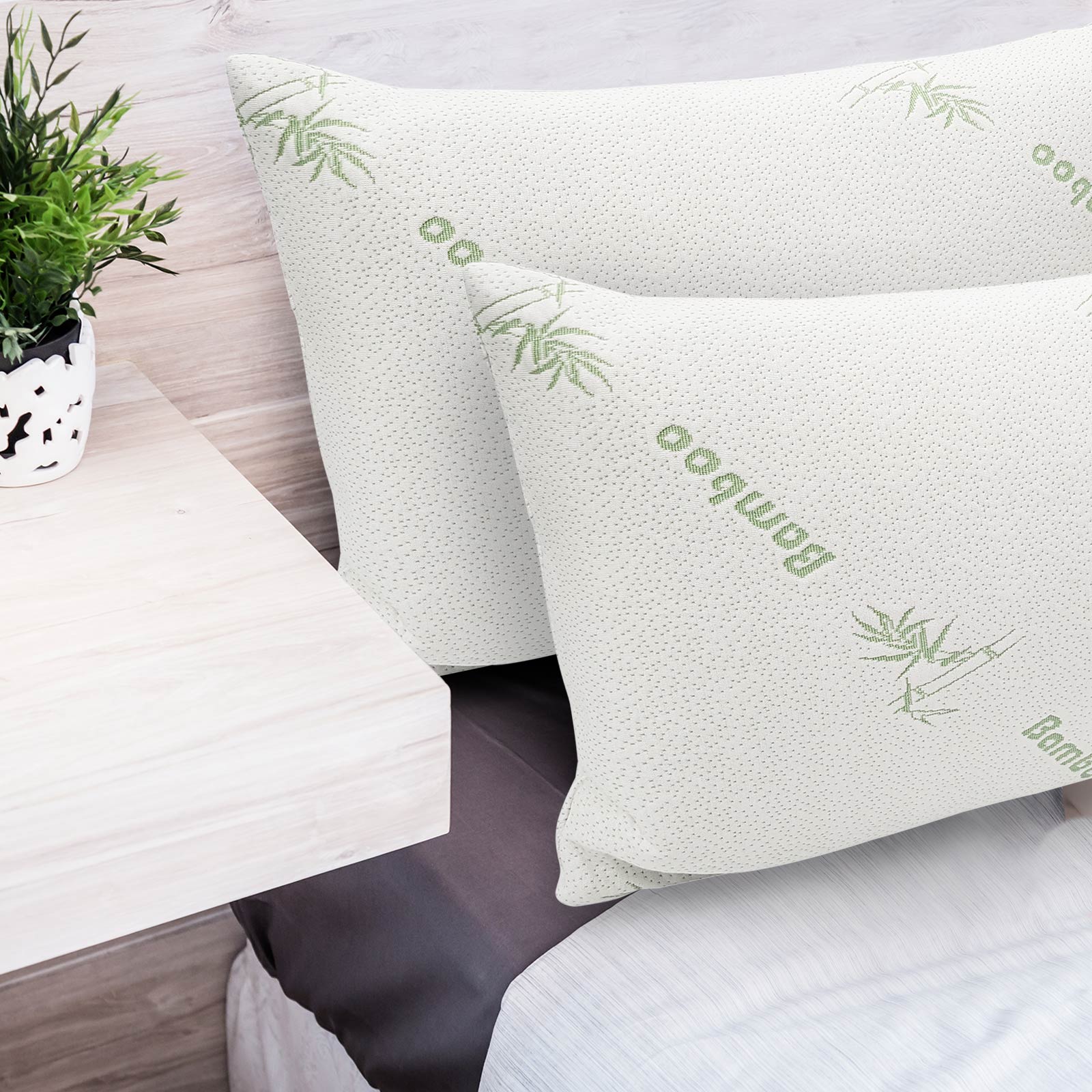 Bamboo-Covered Memory Foam Pillow with soft texture and removable cover, ideal for restful sleep.