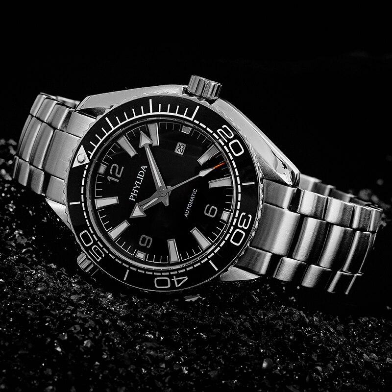 Men's 43.5mm Automatic Watch featuring a black dial, sapphire crystal, and stainless steel band, designed for diving and sports.