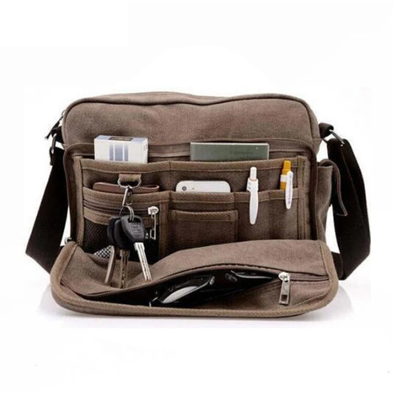 Men's vintage canvas messenger bag with adjustable strap and multiple compartments, perfect for daily use.