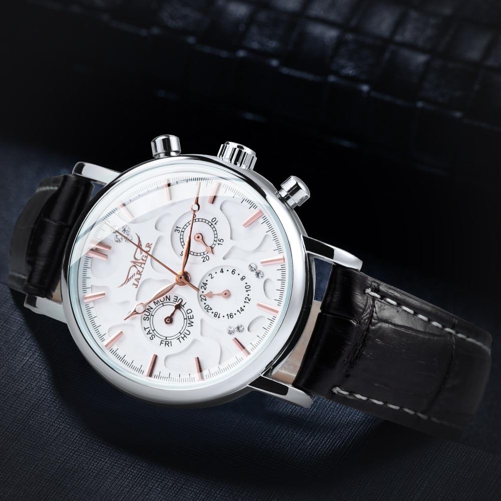 Luxury men's watch with leather strap, 3 sub-dials, and 6 hands, showcasing a stylish design.