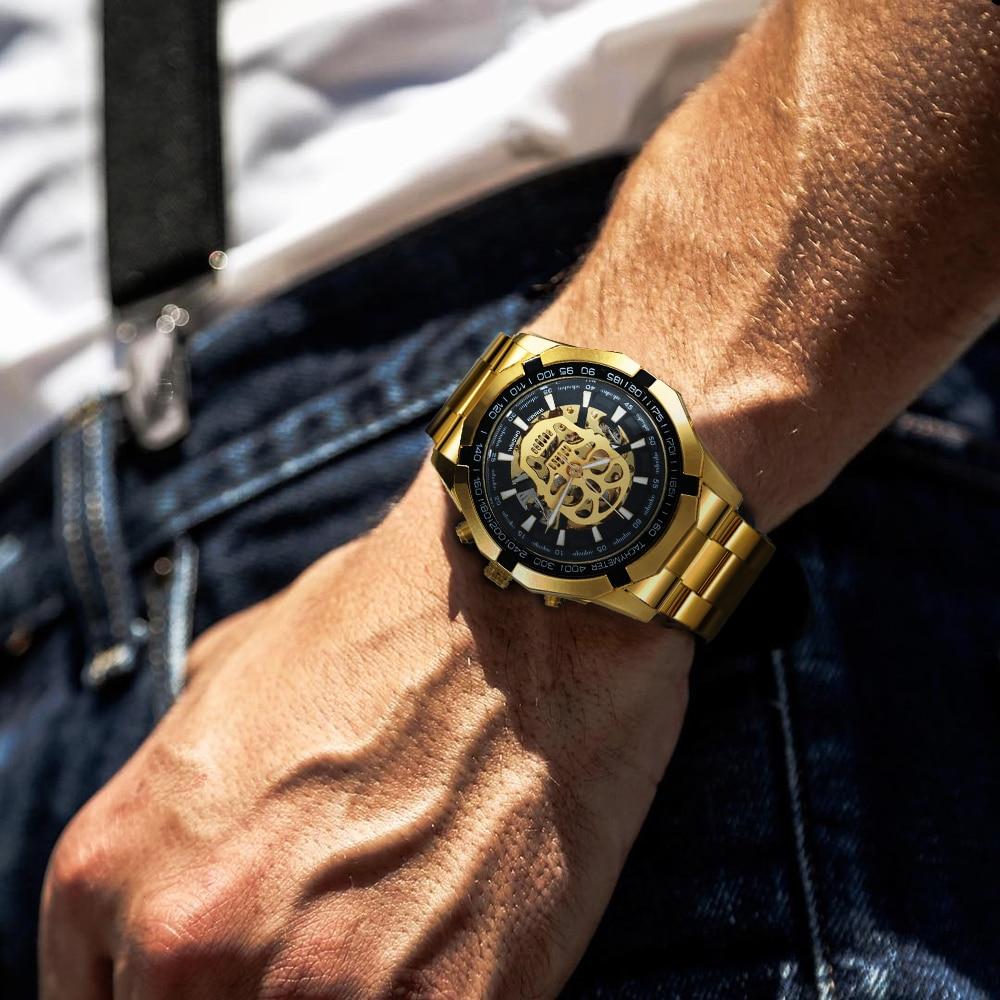 Mens Top Brand Luxury Automatic Mechanical Gold Watch with stainless steel band and luminous features, showcasing a stylish skeleton skull design.