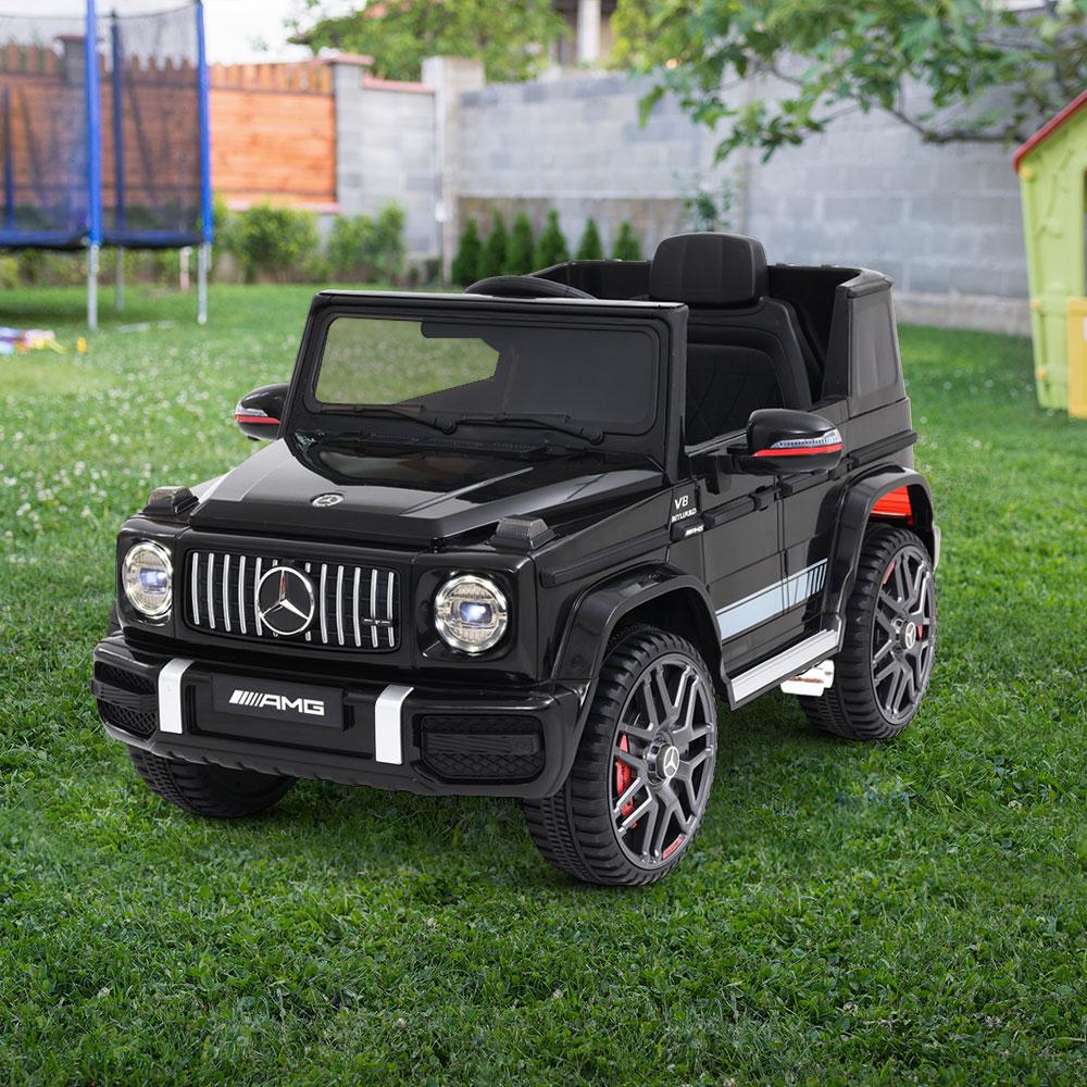 Mercedes-Benz Kids Ride On Car Electric AMG G63 in black, featuring realistic design, headlights, and remote control for safety.