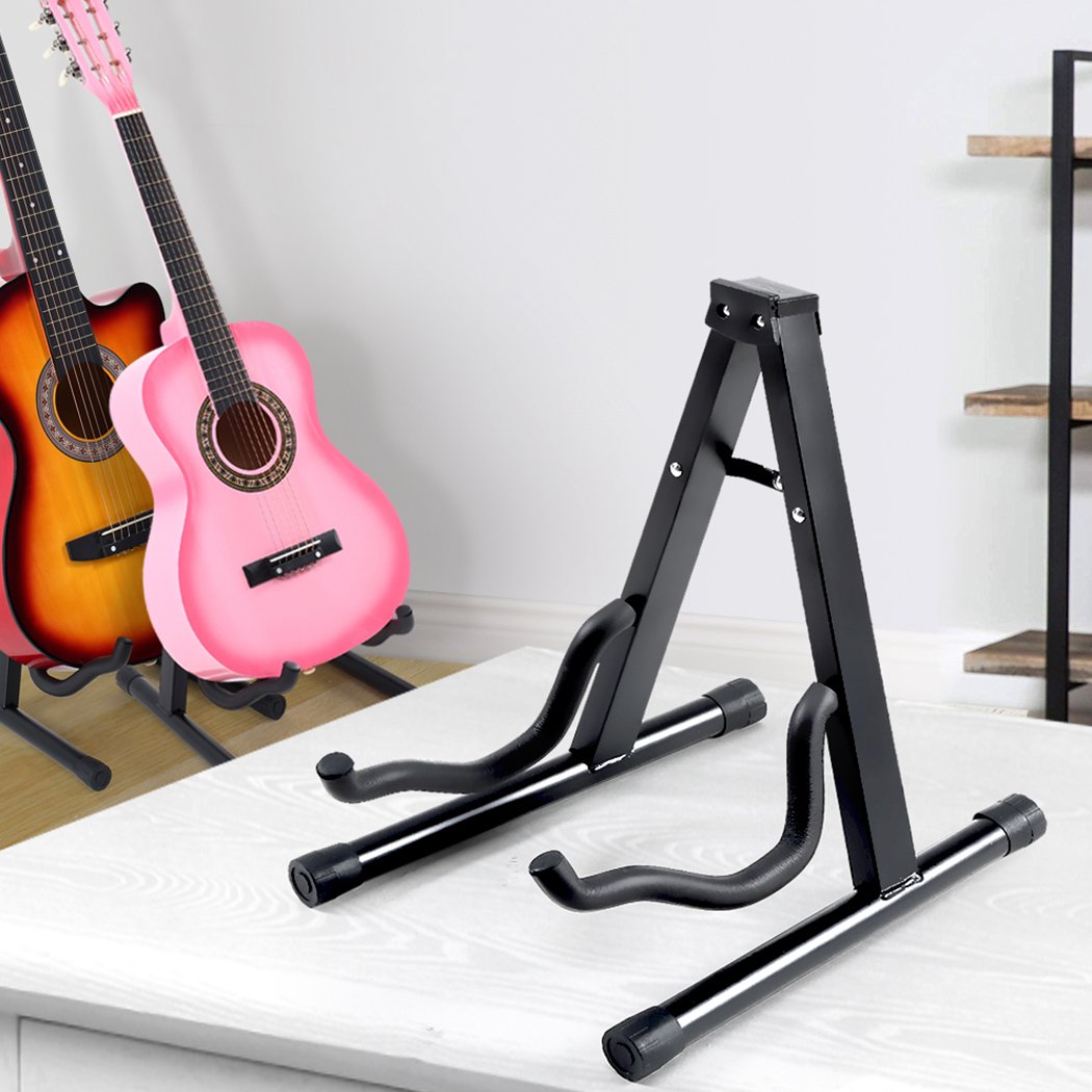 Metal guitar stand with rubber feet, holding electric and acoustic guitars securely, featuring a sleek black design.