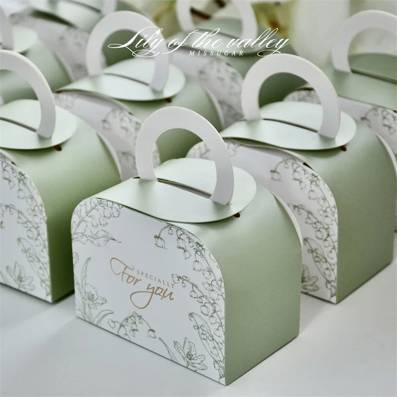 Mini Ramadan portable gift box in various colors, ideal for Eid Mubarak celebrations, featuring a ribbon and sturdy paperboard design.