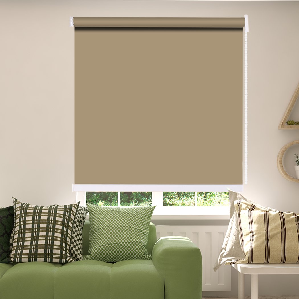 Modern Blockout Roller Blinds in tan color, showcasing a sleek design and full sun shading capabilities, ideal for home decor.