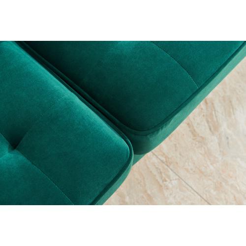 Modern Velvet fabric sofa in emerald green with golden metal legs and decorative pillows.