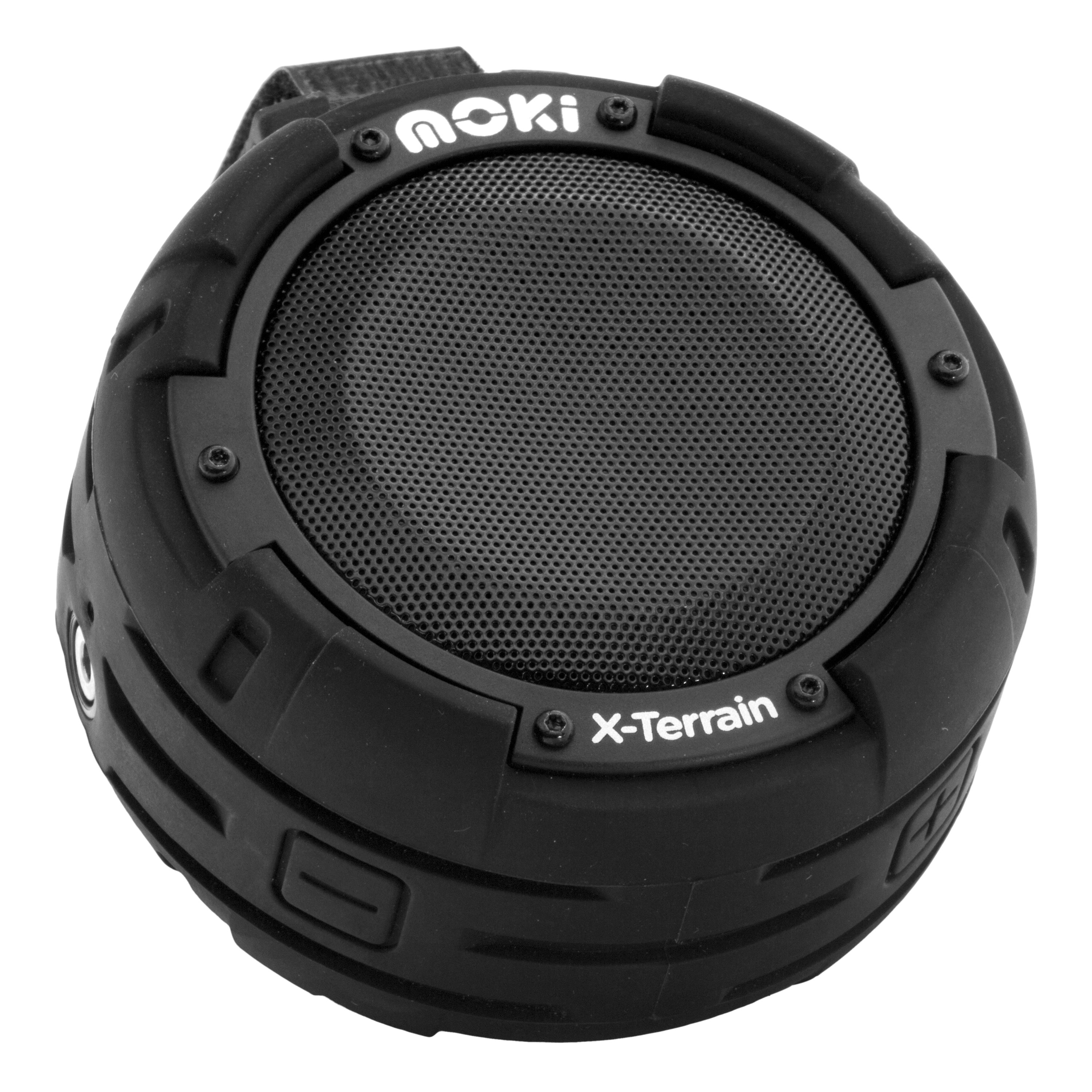 Moki X-Terrain Wireless Speaker in a rugged outdoor setting, showcasing its waterproof and shockproof design.