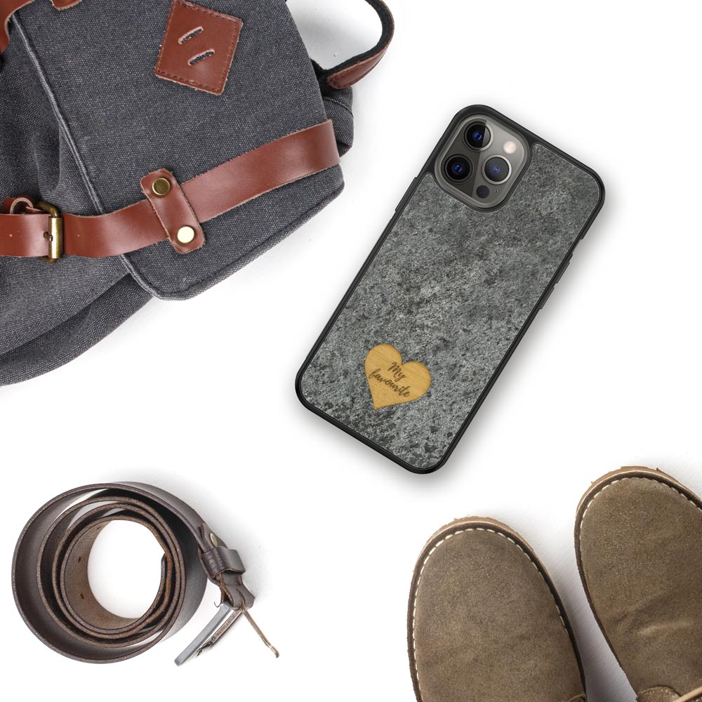 Personalized Mountain Stone phone case featuring a wooden heart with custom text engraving.