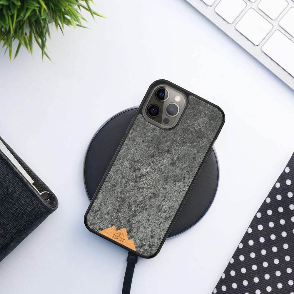 Mountain Stone Phone Case showcasing unique natural texture and sparkly grey color, held in hand against a natural backdrop.