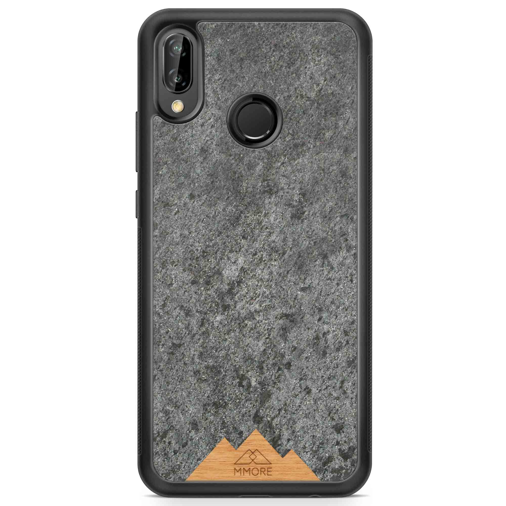 Mountain Stone Phone Case showcasing unique natural texture and sparkly grey color, held in hand against a natural backdrop.