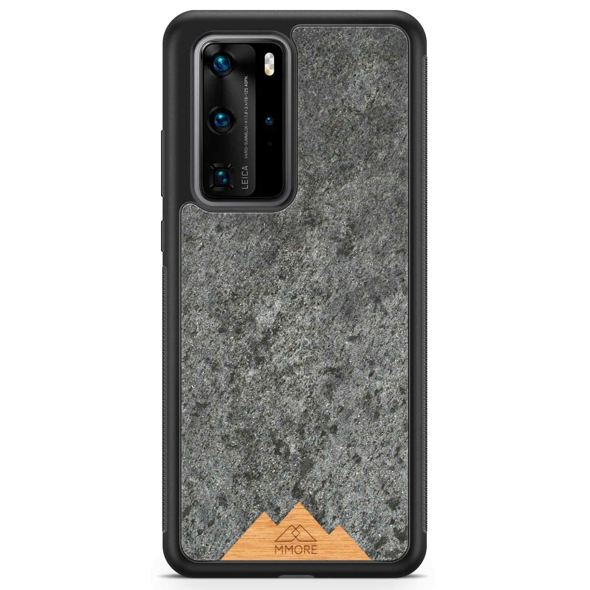 Mountain Stone Phone Case showcasing unique natural texture and sparkly grey color, held in hand against a natural backdrop.