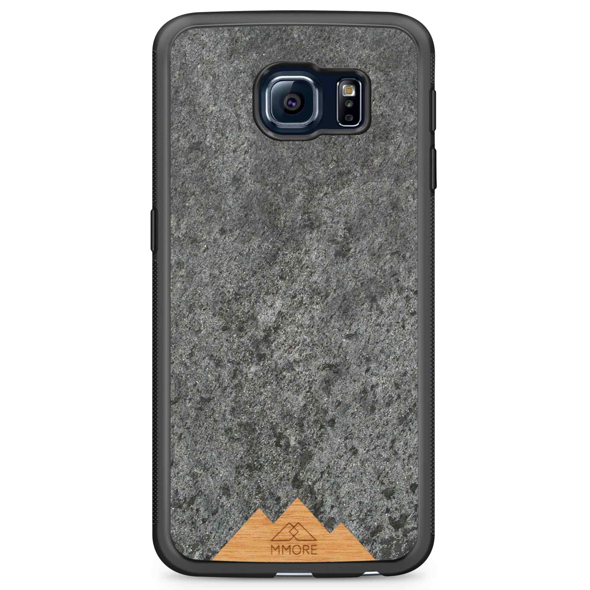 Mountain Stone Phone Case showcasing unique natural texture and sparkly grey color, held in hand against a natural backdrop.