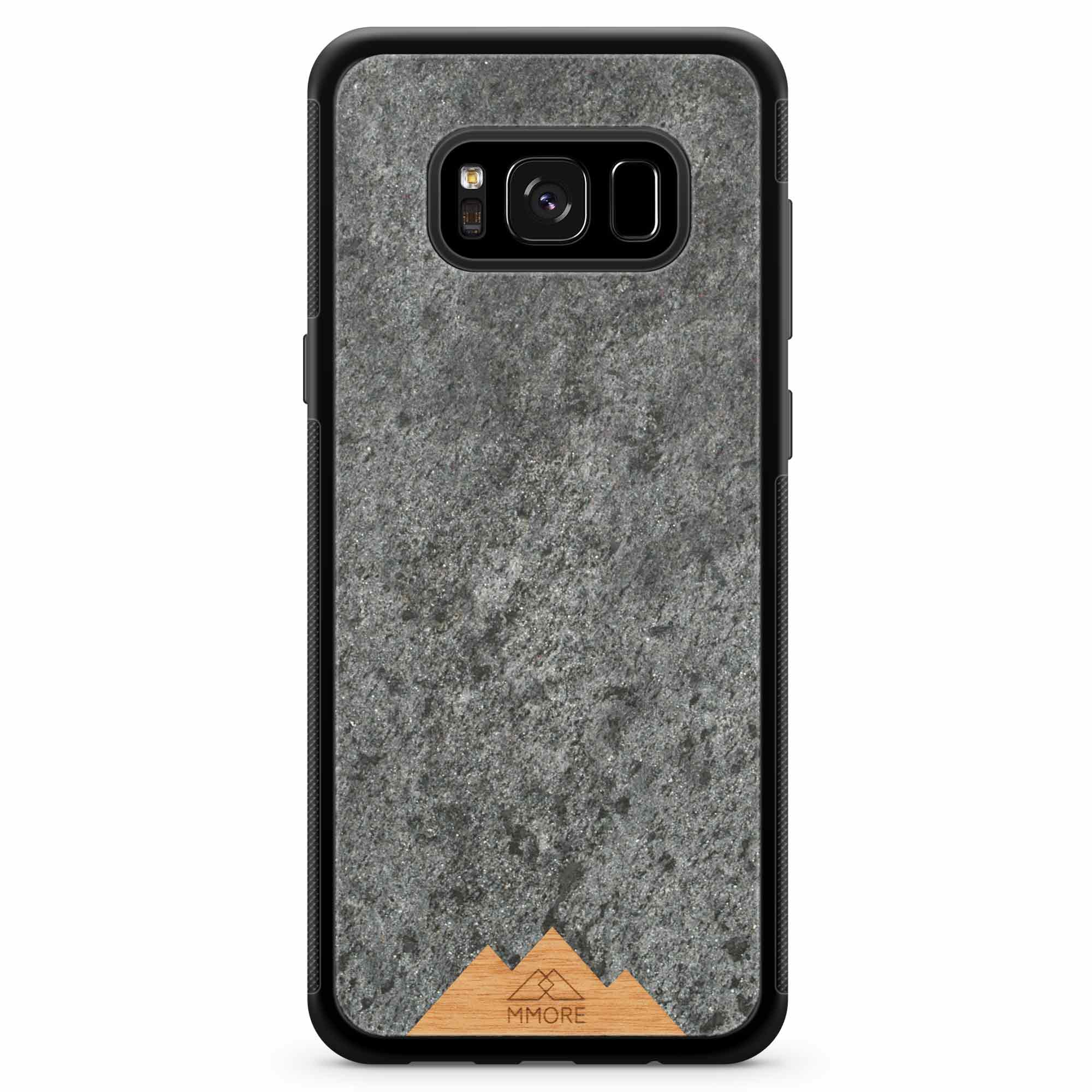 Mountain Stone Phone Case showcasing unique natural texture and sparkly grey color, held in hand against a natural backdrop.